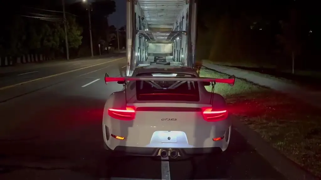 Vehicle loading on enclosed car hauler